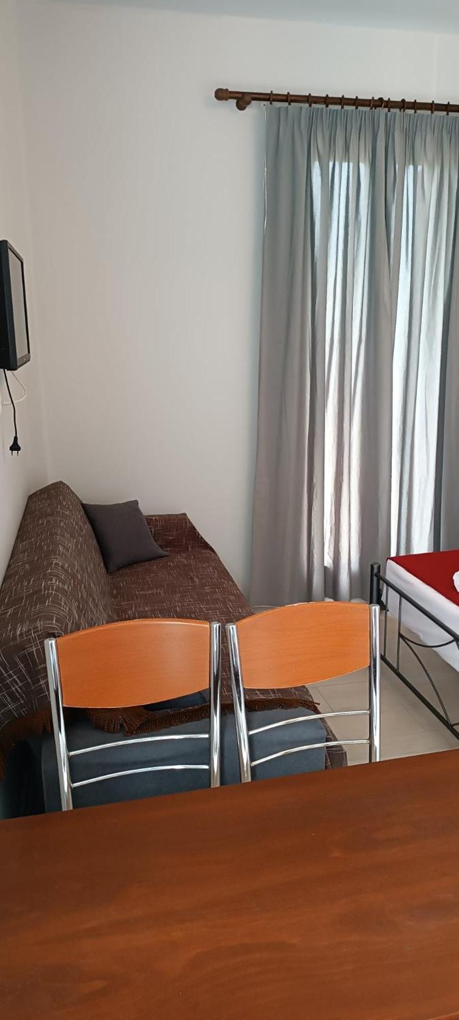 Andros Guesthouses Habitación foto